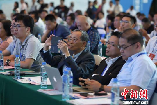 研討會現(xiàn)場圖?！■暮陚?攝