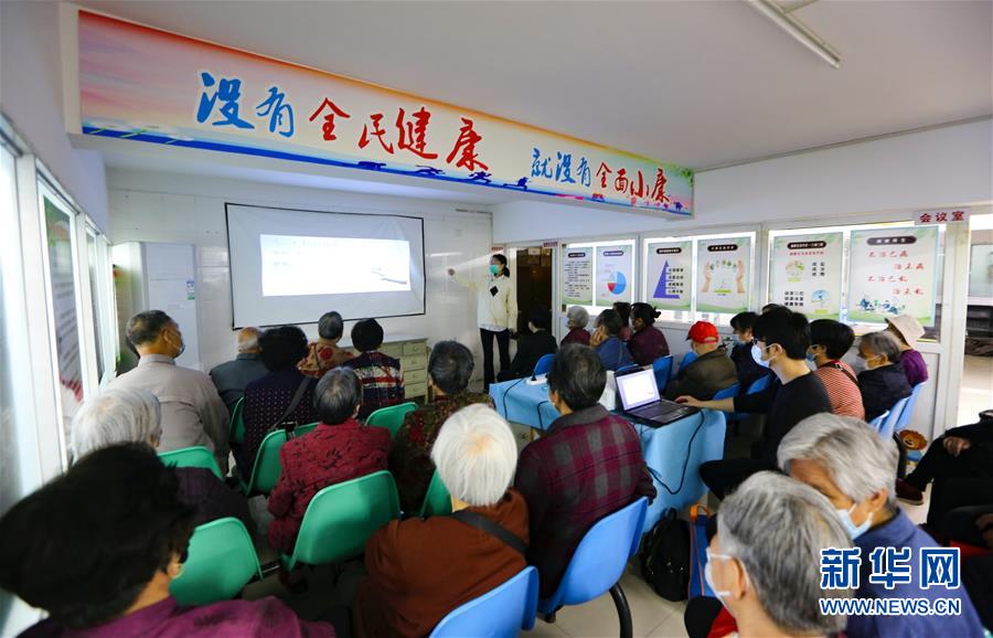 （新華全媒頭條·兩會精神看落實·圖文互動）（3）整體謀劃、系統(tǒng)升級、全面提升——落實全國兩會精神織牢織密公共衛(wèi)生防護網(wǎng)